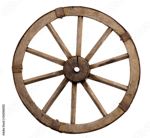 Old wagon wheel on a white background photo