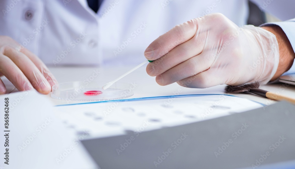Drug synthesis lab experimentnig with pills