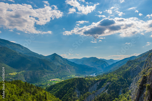 A picturesque landscape view of the French Alps mountains and the valley of river Var  Puget-Theniers  Alpes-Maritimes  France 