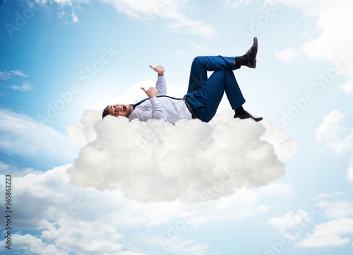 Wallpaper Mural Young male businessman enjoying his time during vacation Torontodigital.ca