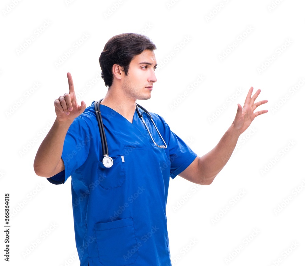 Young male doctor pressing buttons isolated on white Young male doctor pressing buttons isolated on white