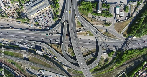 Kyiv Intersecting Highways Cars Rush Circling Drone Moving Down 4k Metro Station ''Chernigivska''. photo