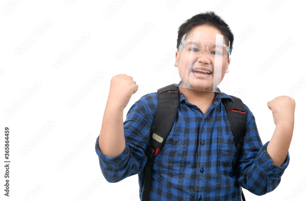 Asian boy student wear face shield excited surprised or make winner gesture Asian boy student wear face shield excited surprised or make winner gesture