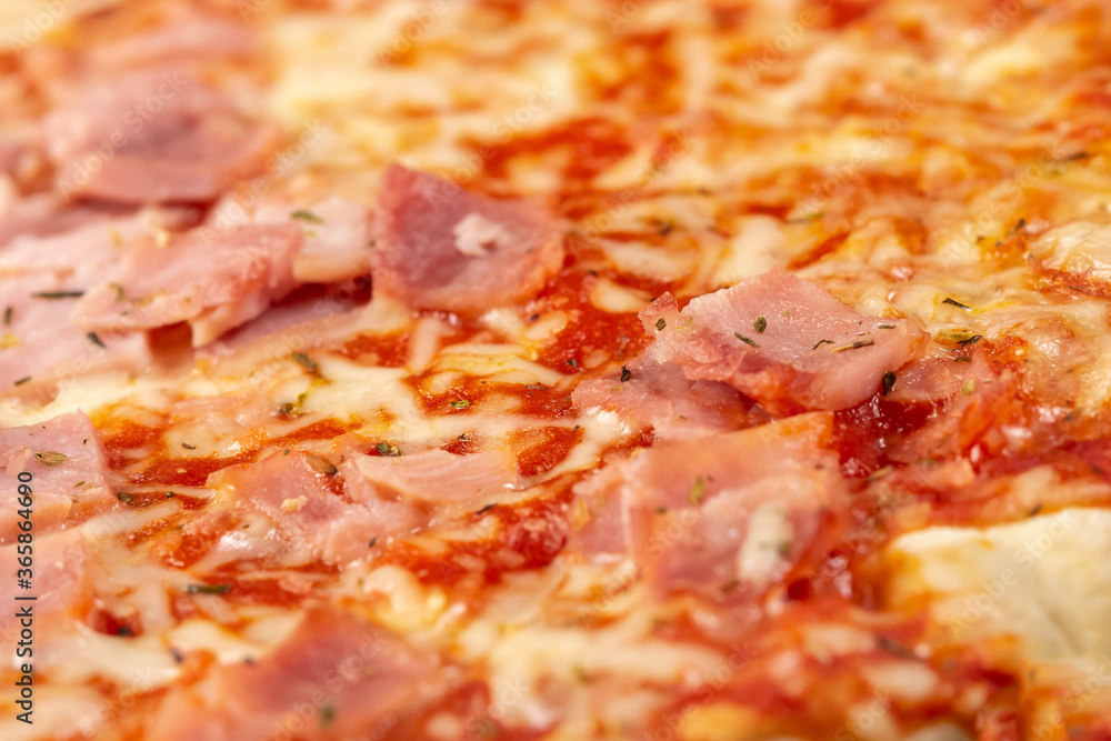 closeup of delicious mozzarella and ham pizza closeup of delicious mozzarella and ham pizza