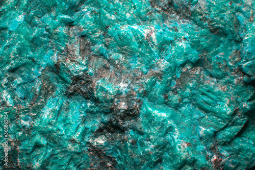 Light aquamarine stone background with microcracks, splashes of quartz and fine texture