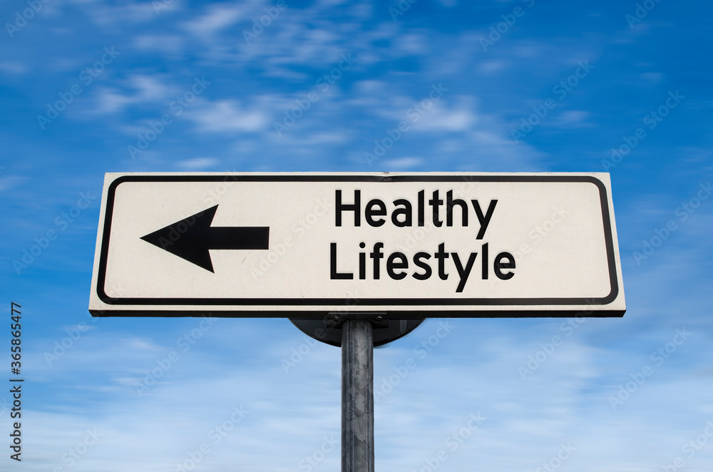 Healthy lifestyle road sign, arrow on blue sky background. One way blank road sign with copy space. Arrow on a pole pointing in one direction. Healthy lifestyle road sign, arrow on blue sky background. One way blank road sign with copy space. Arrow on a pole pointing in one direction.
