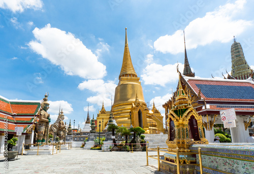 picture of The Temple of the Emerald Buddha and the grand palace in the sunnyday with blue sky in Bangkok, Thailand © plo
