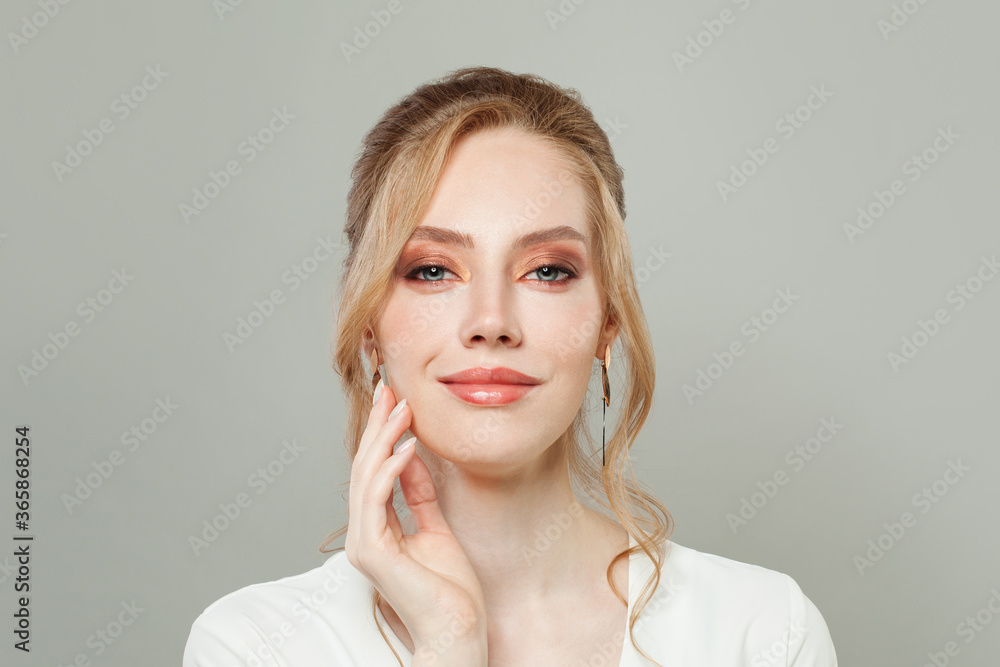 Perfect young woman face with clear healthy skin and makeup close up portrait Perfect young woman face with clear healthy skin and makeup close up portrait