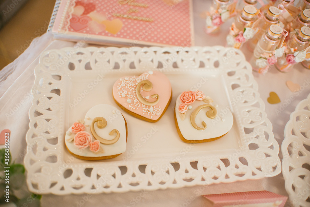 Elegant cookies with decoration in pink and gold Elegant cookies with decoration in pink and gold