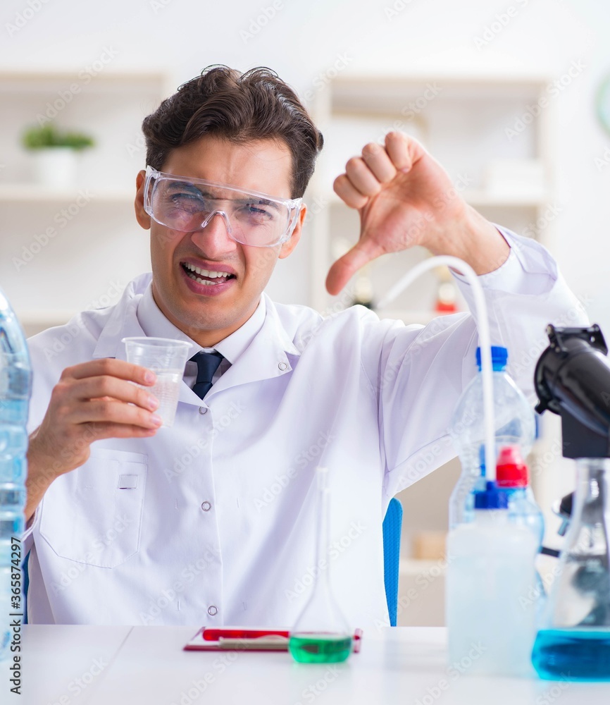 Lab assistant testing water quality Lab assistant testing water quality