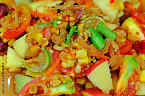 Close up hot and spicy mixed fruits salad. Thai food.