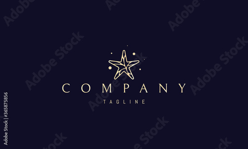 Vector golden logo on which an abstract image of a starfish.