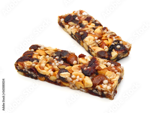 Honey bars with peanuts on white background