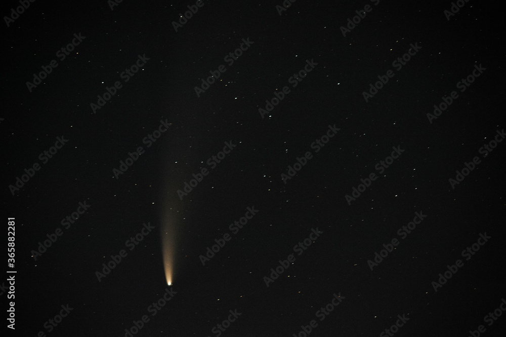 Obraz premium Stare selo, Ukraine, 16 July 2020. Neowise comet above the castle of Stare selo village in Ukraine.