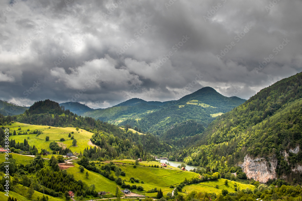 Beautiful small Spajici lake on Tara mountain in Serbia, Surrounded with mountain peaks Beautiful small Spajici lake on Tara mountain in Serbia, Surrounded with mountain peaks