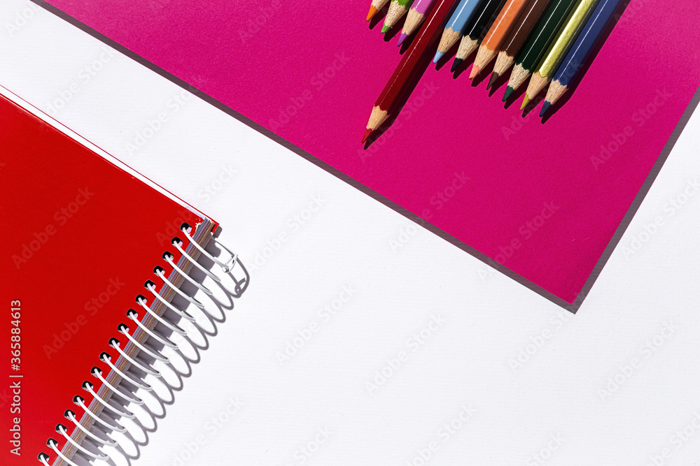 Back to school supplies, notebooks, colored pencils Back to school supplies, notebooks, colored pencils