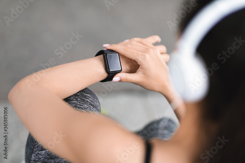 Fitness Tracker. Woman Checking Her Sport Progress On Smartwatch After Training Outdoors