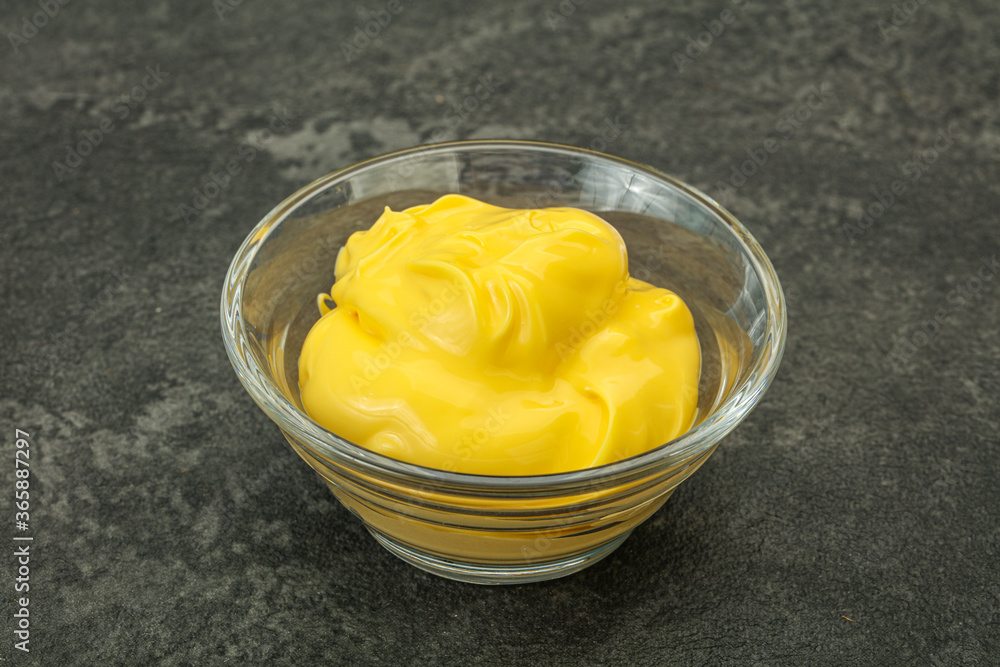 Natural cheese sauce in the bowl Natural cheese sauce in the bowl