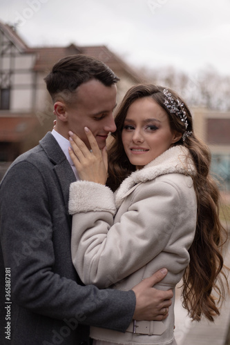 beautiful couple, bride and groom in long dress, part, wedding, girl with curvy hair