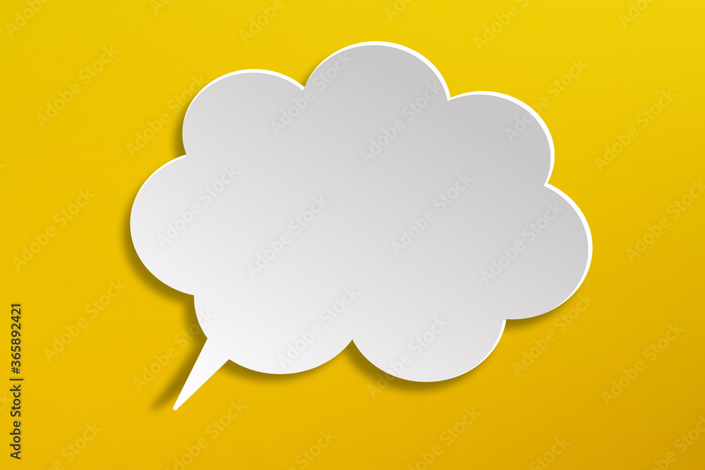 Empty white speech bubble on yellow background Empty white speech bubble on yellow background