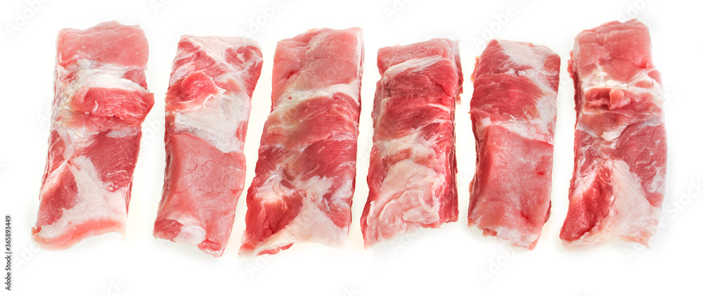 Sliced raw pork ribs on a white background, isolate