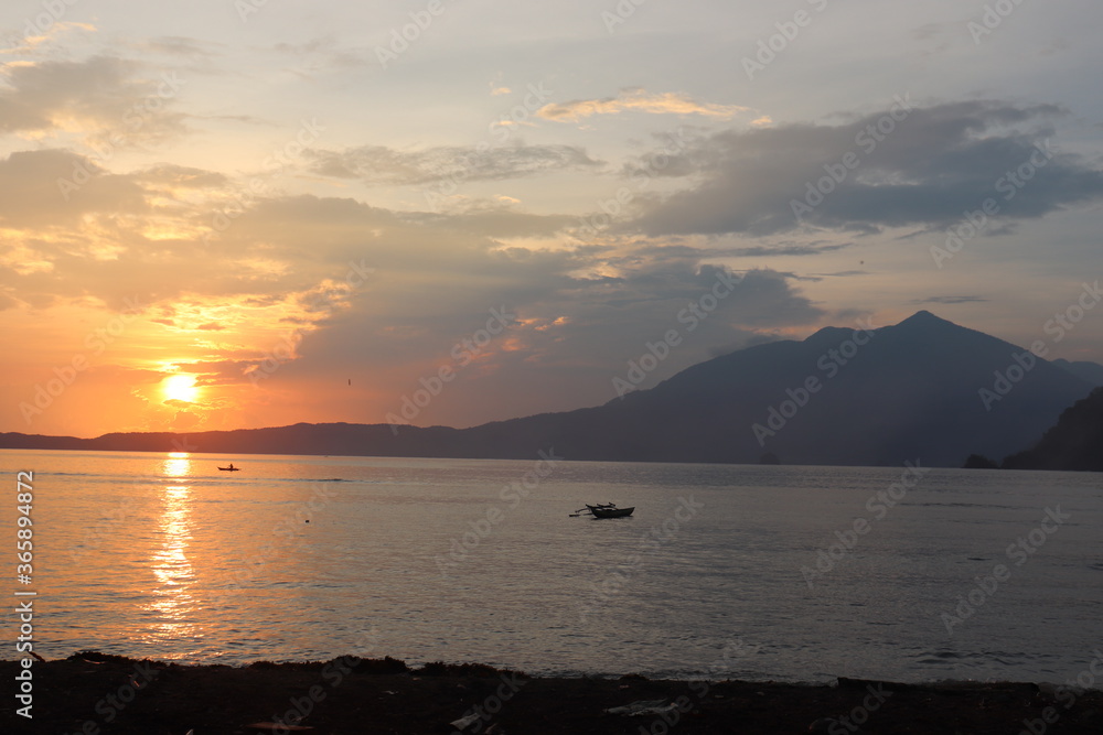 Tanah Merah Bay and Cycloop Mountains with a Background Morning Sun
