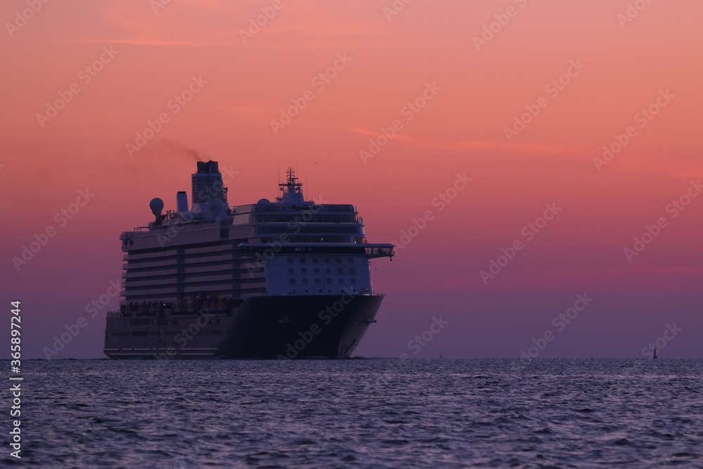giant cruise ship at dawn