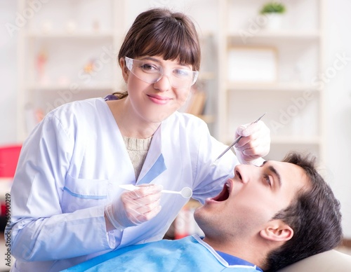 Patient visiting dentist for regular check-up and filling