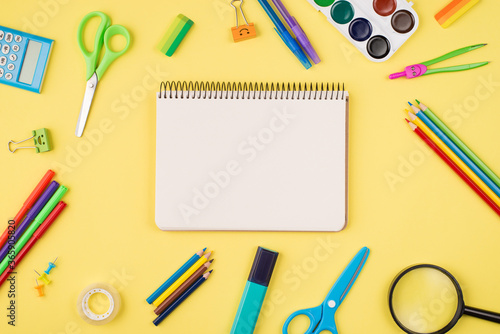 Top above overhead view photo of blank notebook colorful stationery isolated on yellow background with copyspace