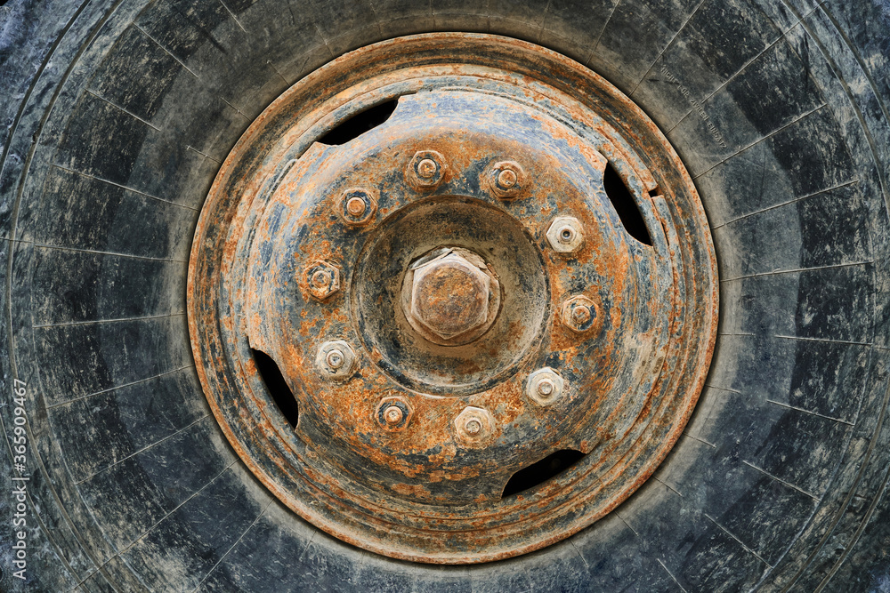 Fototapeta premium big wheel close view of old tractor as background