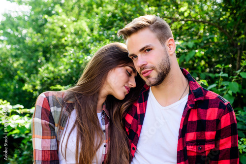 Passionate love. family weekend. romantic date. hipster couple outdoor. man and woman in checkered shirt relax in park. couple in love. Hiking. valentines day. summer camping in forest