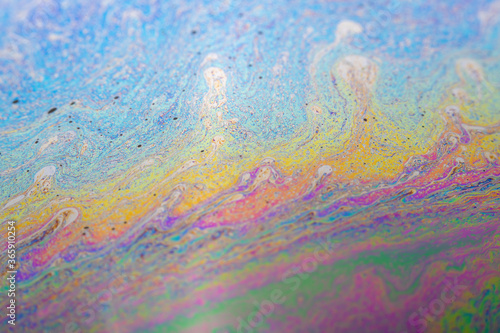 Abstract background texture of iridescent paints. Soap bubble