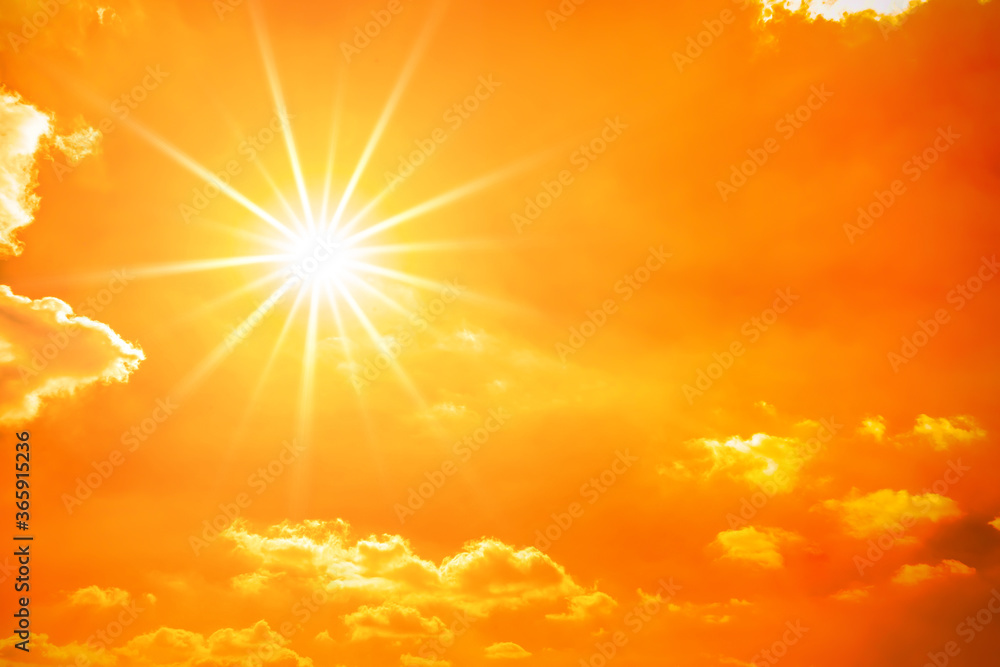 Hot summer or heat wave background, orange sky with clouds and glowing sun - obrazy, fototapety, plakaty 