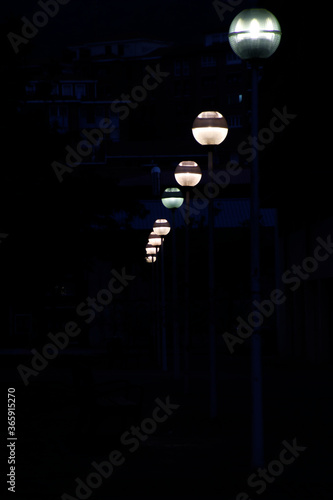 Lanterns at night in an urban environment