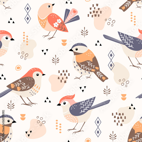 Seamless folk style pattern of cute birds with geometric elements.