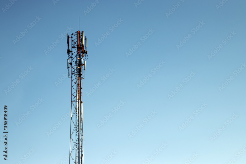 cell tower, silhouette against the blue sky. Communication concept, next generation networks. cell tower, silhouette against the blue sky. Communication concept, next generation networks.