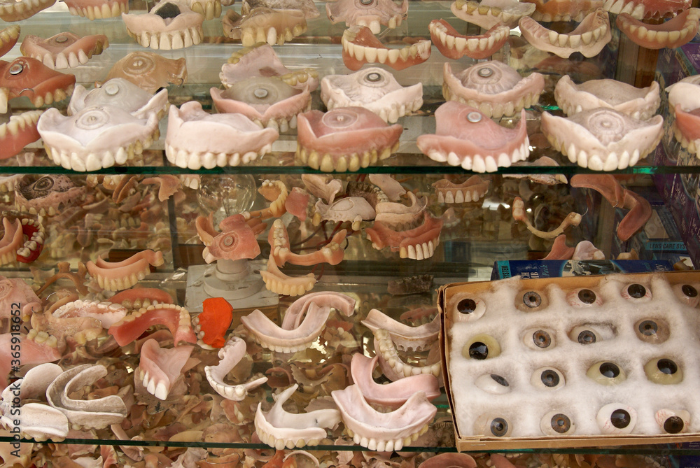 False teeth and prosthetic eyeballs in an Old City shop window, Udaipur, Rajasthan, India False teeth and prosthetic eyeballs in an Old City shop window, Udaipur, Rajasthan, India