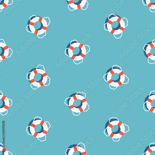 Seamless pattern with swim ring isolated on blue background.
