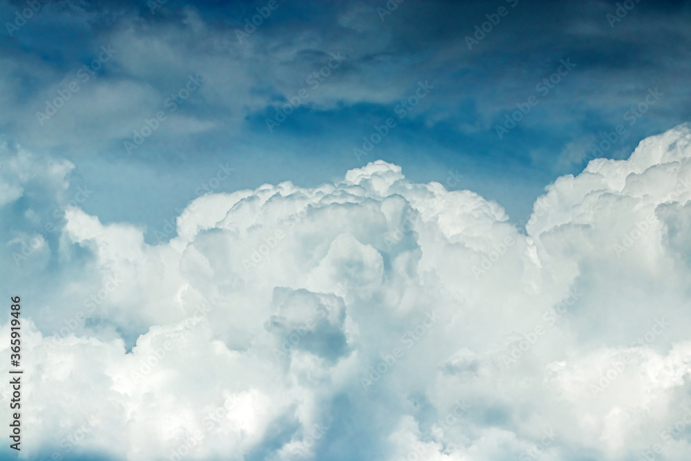 White clouds against the blue sky. Cloudy landscape. Sunny day fluffy clouds White clouds against the blue sky. Cloudy landscape. Sunny day fluffy clouds
