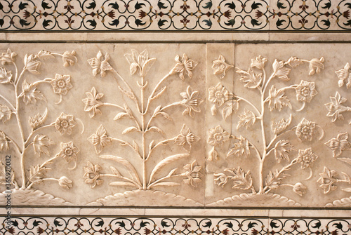 Carved marble and inlay work on exterior of Taj Mahal, Agra, India photo