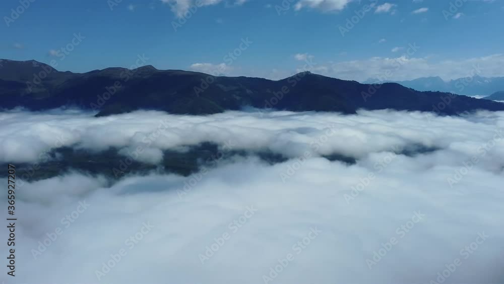 Dense clouds in the early morning light in the Alps of Austria. Dense clouds in the early morning light in the Alps of Austria.
