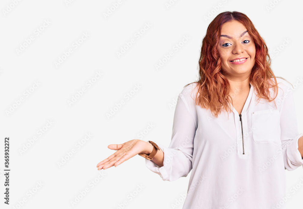 Young latin woman wearing casual clothes clueless and confused expression with arms and hands raised. doubt concept. Young latin woman wearing casual clothes clueless and confused expression with arms and hands raised. doubt concept.