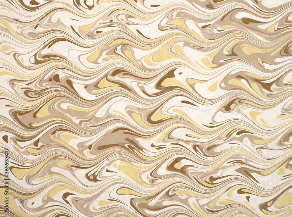 An ink marbling abstract pattern, similar to marbled ink techniques used on the inner cover linings of vintage and antiquarian books An ink marbling abstract pattern, similar to marbled ink techniques used on the inner cover linings of vintage and antiquarian books