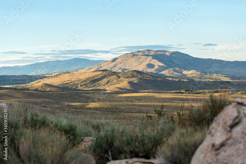 Evening light on a desert mountain with sagebrush in the foreground