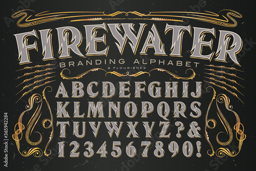 Firewater Branding Alphabet is a Heavily Stylized Serif Capitals Font with Zig Zag Lines Reminiscent of Flames; Ideal Set of Graphics and Letters for Alcohol Branding.