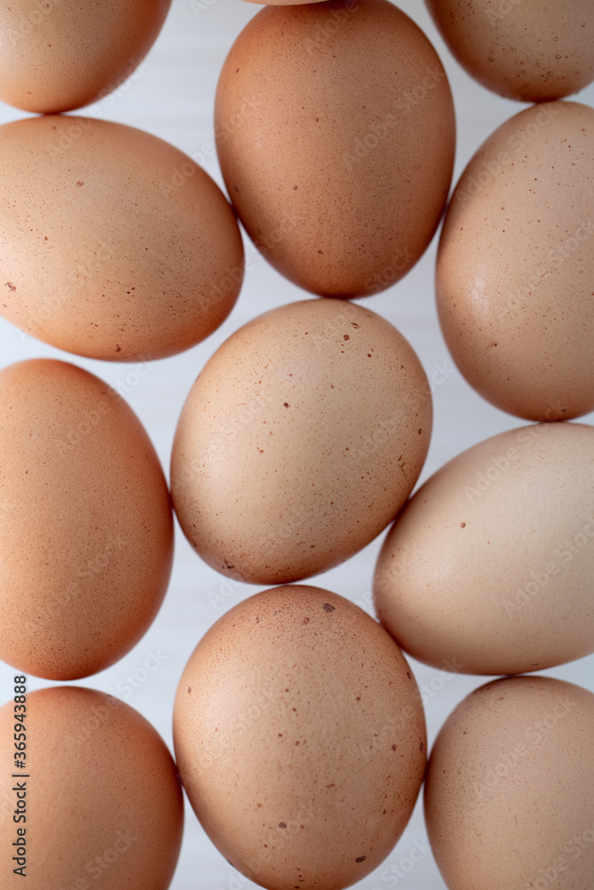 Close up raw brown organic fresh eggs Close up raw brown organic fresh eggs