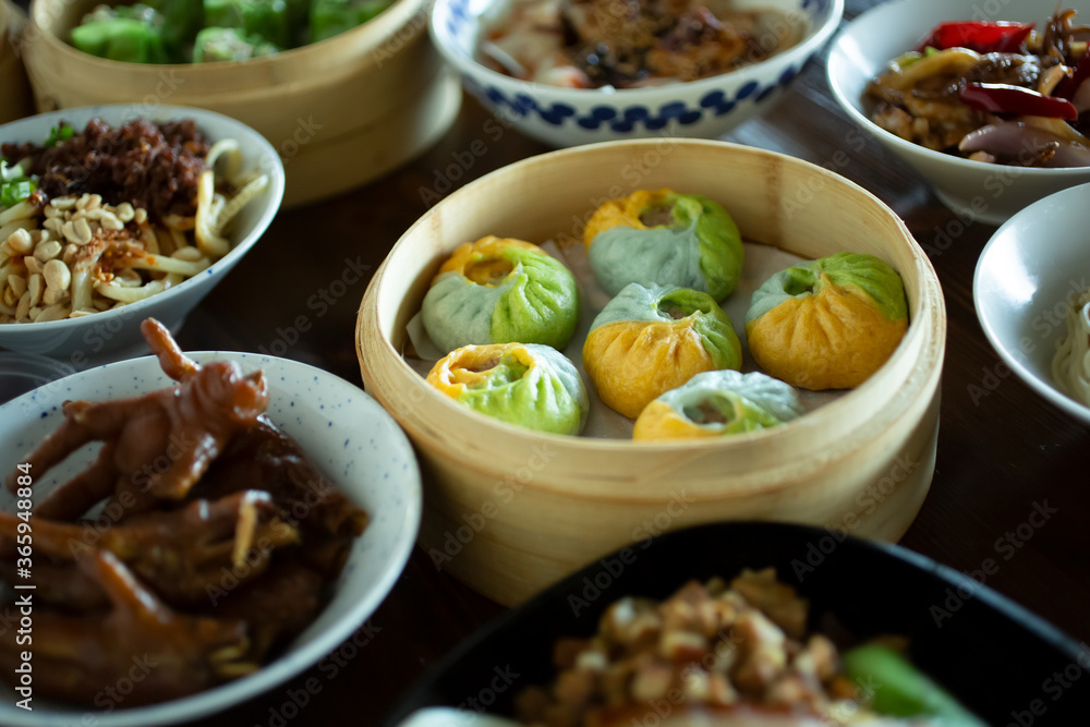 A view of a prepared Chinese food layout in a restaurant setting. A view of a prepared Chinese food layout in a restaurant setting.