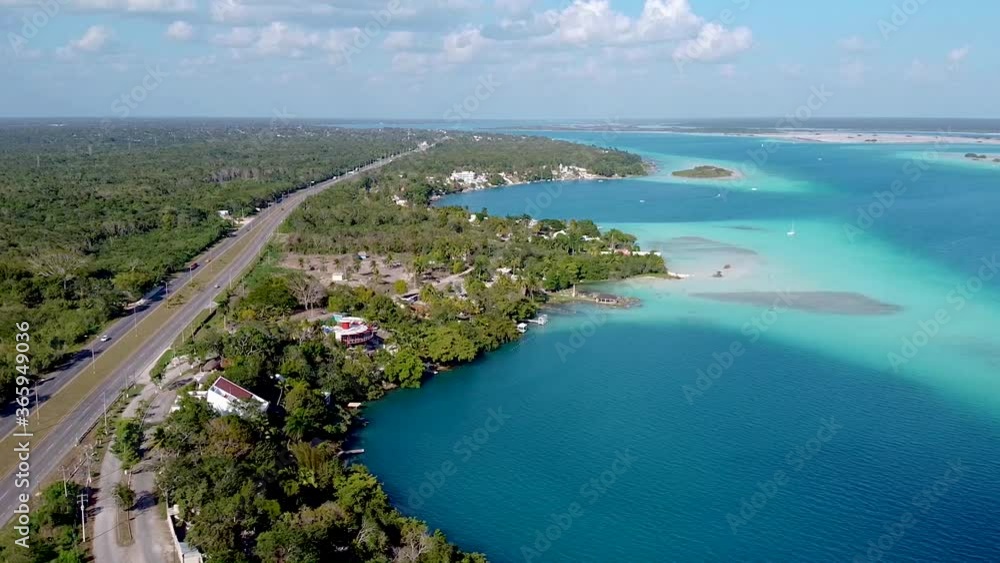 Aerial drone flying sideways over cenotes in Lake Bacalar Aerial drone flying sideways over cenotes in Lake Bacalar