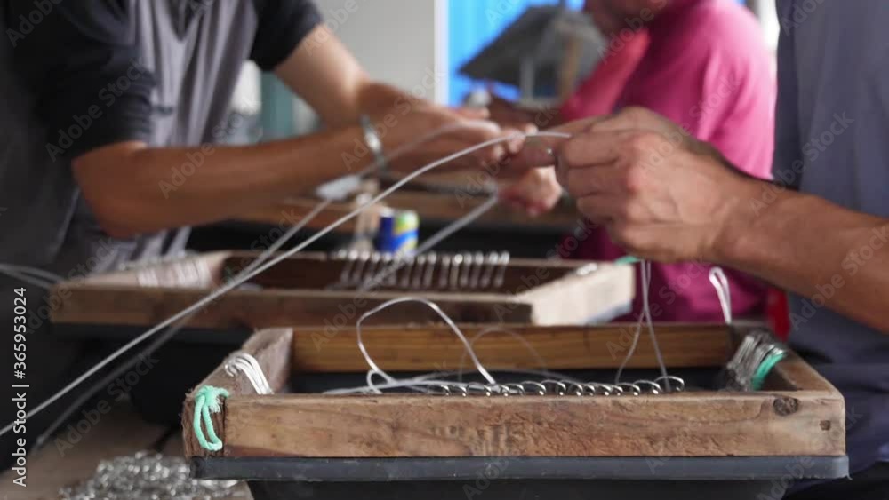 fishermen preparing fishing hooks slow motion fishermen preparing fishing hooks slow motion