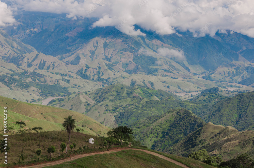 Mountain landscape in Colombian Andes, old uncovered road